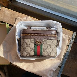 Ophidia GG Top Handle Mini Bag baby it’s Gucci!